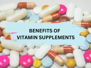 A pile of vitamin pills with the words 'Benefits of Vitamin Supplements'